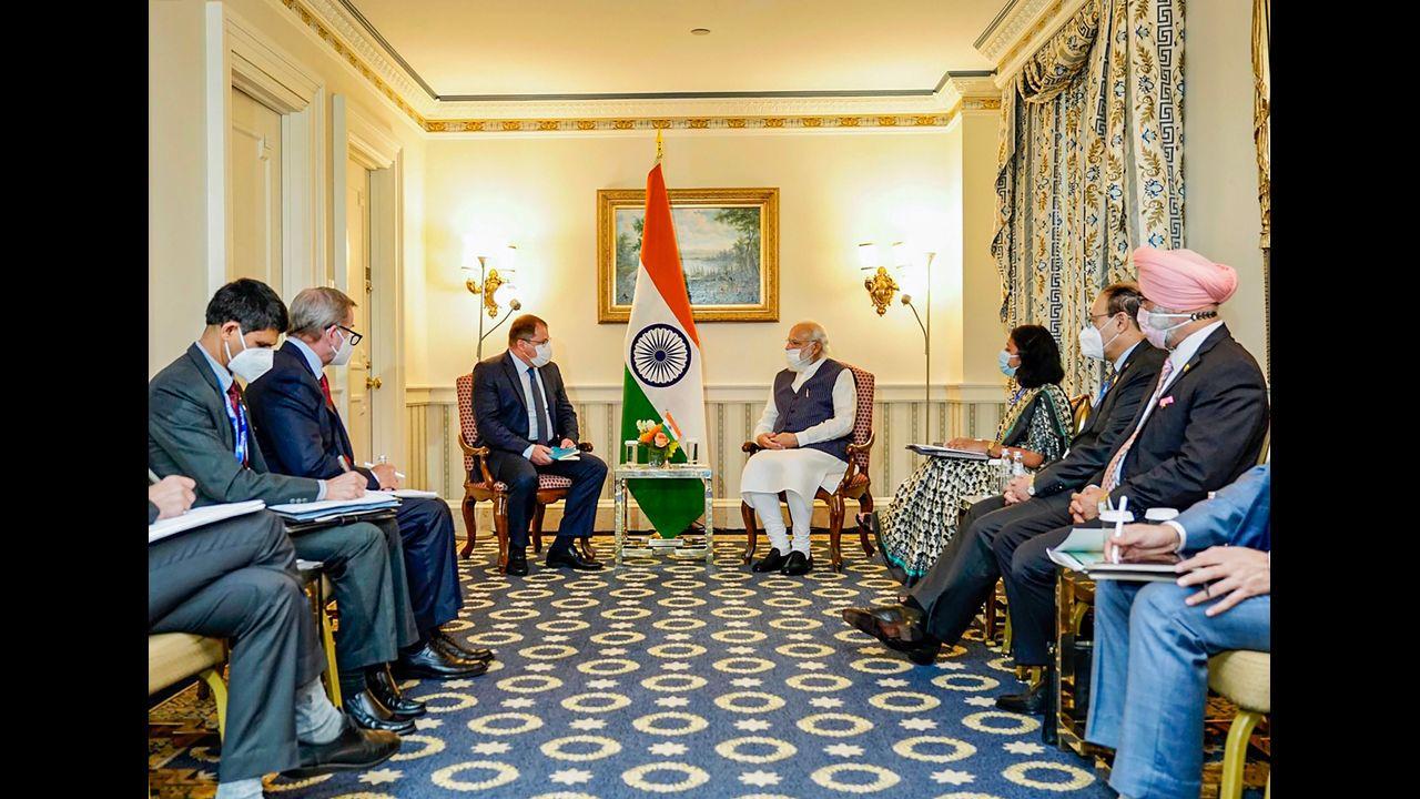 Prime Minister Narendra Modi with CEO of Qualcomm Cristiano Amon during a meeting. Pic/PTI